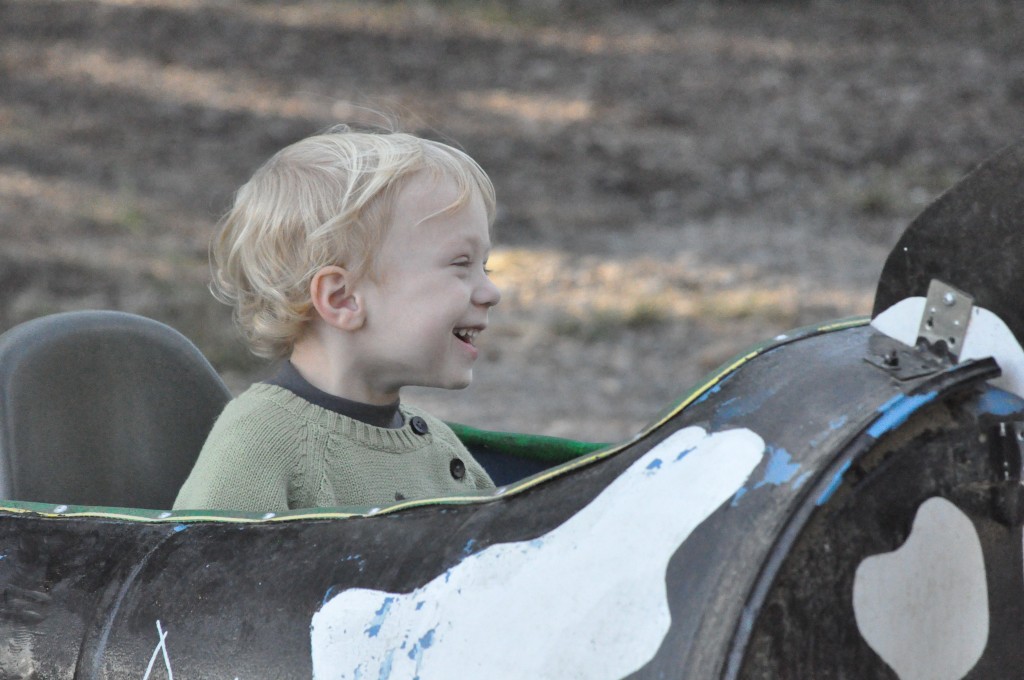 Brooks riding his cow